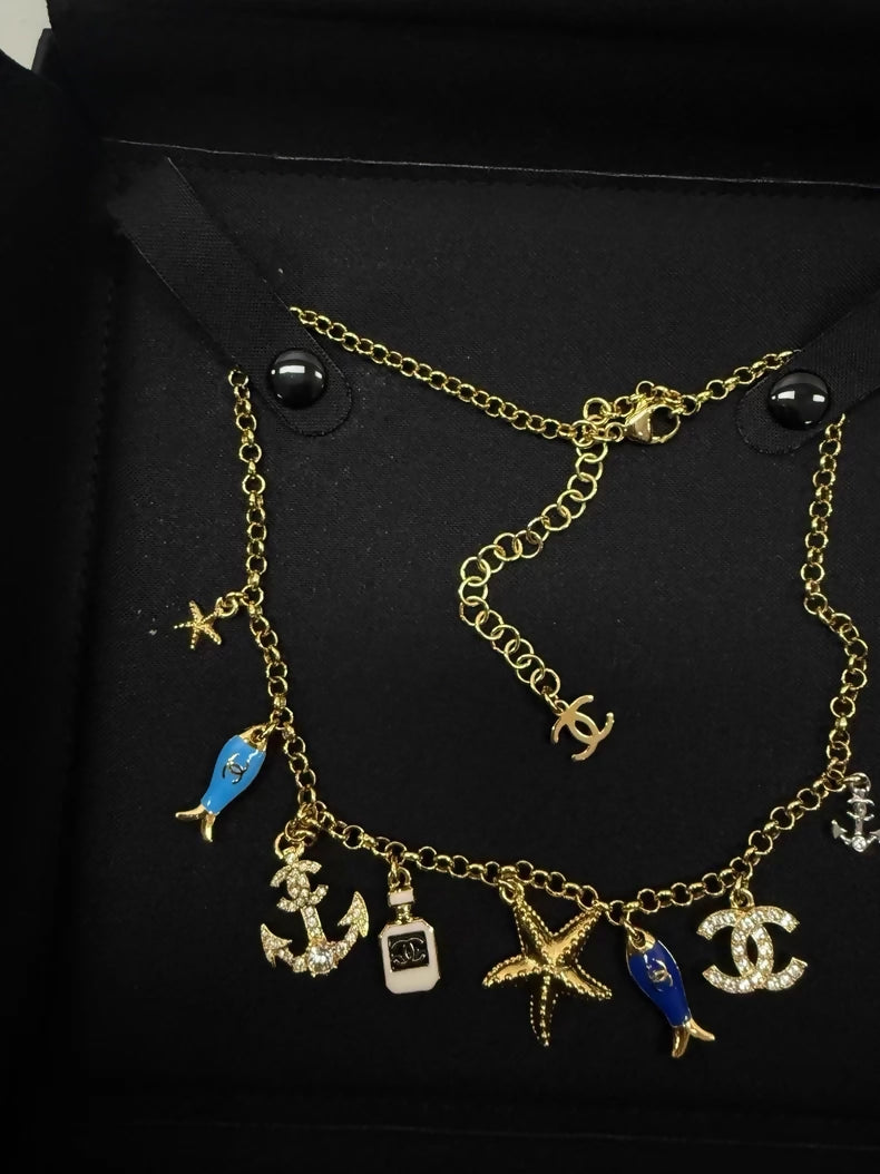 Chanel 25C Ocean Fish and Starfish charm Necklace