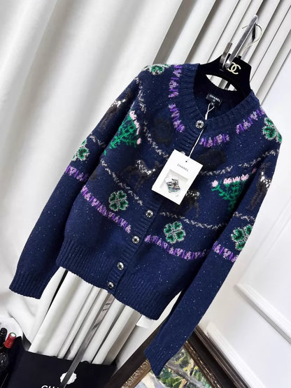 Chanel 25n Coco Neige Ski Collection navy blue knit cardigan