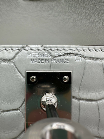 Hermès Kelly 20 Gris Neve Matte Alligator PHW K 2026