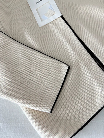 Chanel 26S off-white knit cardigan with black trim