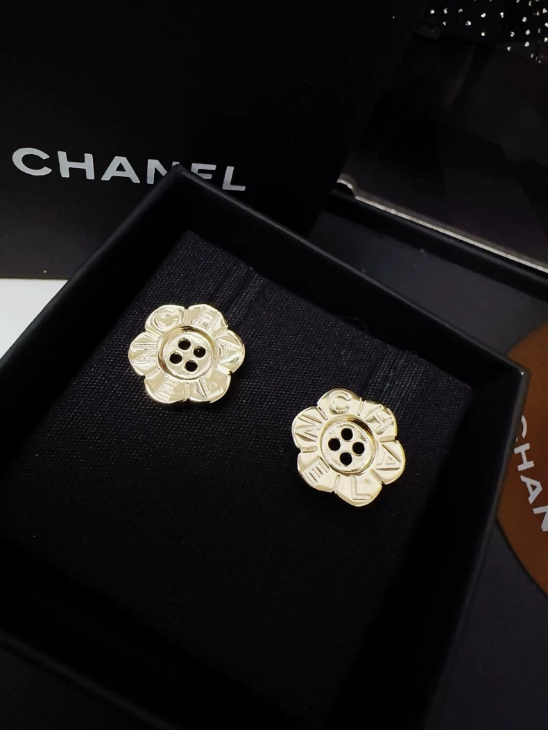 Chanel 25K gold flower button earrings