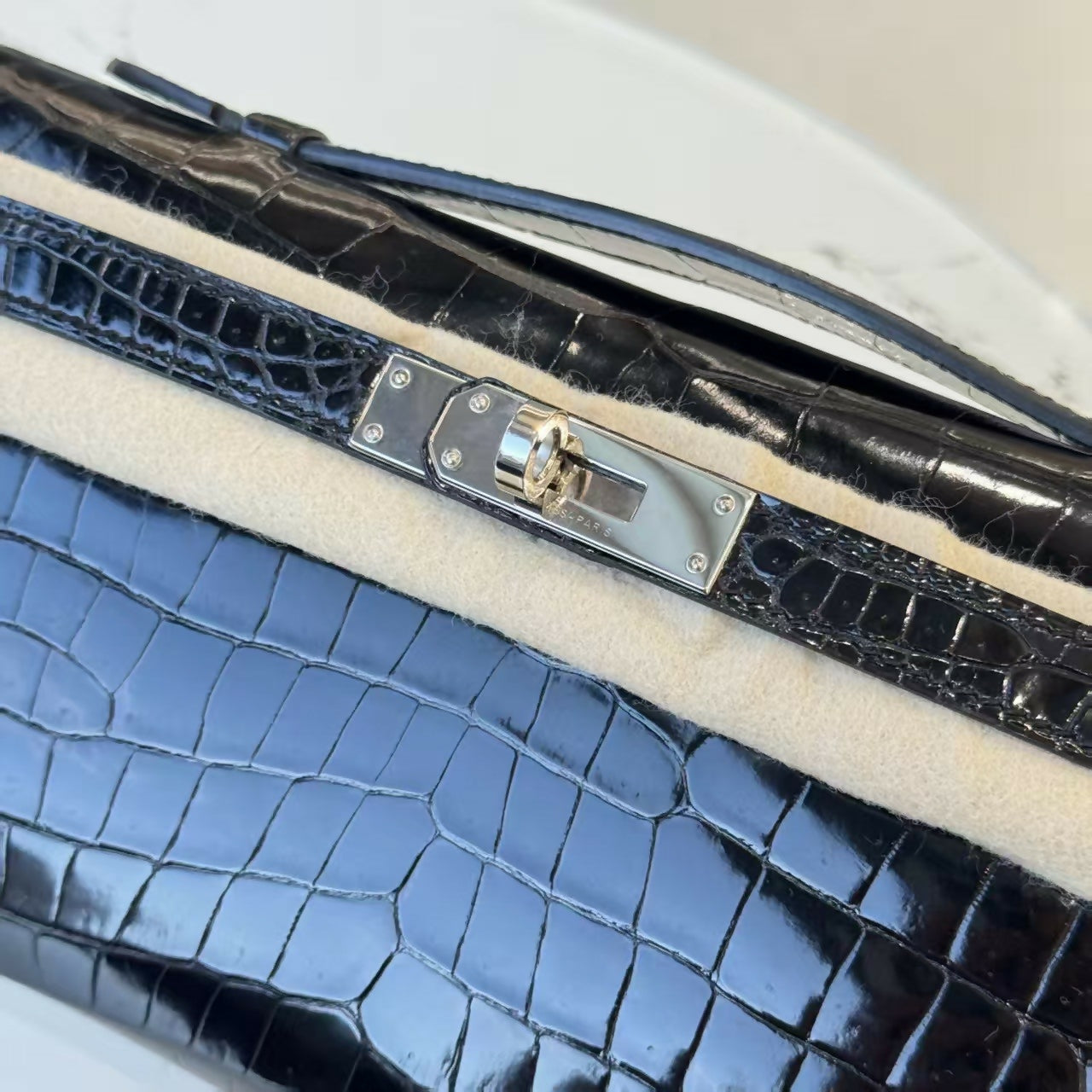 Hermes Kelly cut black shiny crocodile leather palladium hardware