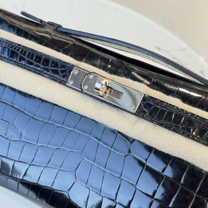 Hermes Kelly cut black shiny crocodile leather palladium hardware