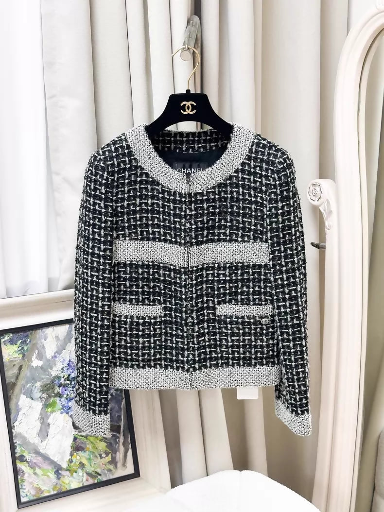 Chanel 17B grey, white, and black mixed-color  tweed jacket and skirt set