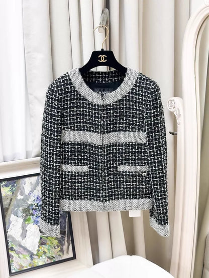 Chanel 17B grey, white, and black mixed-color  tweed jacket and skirt set