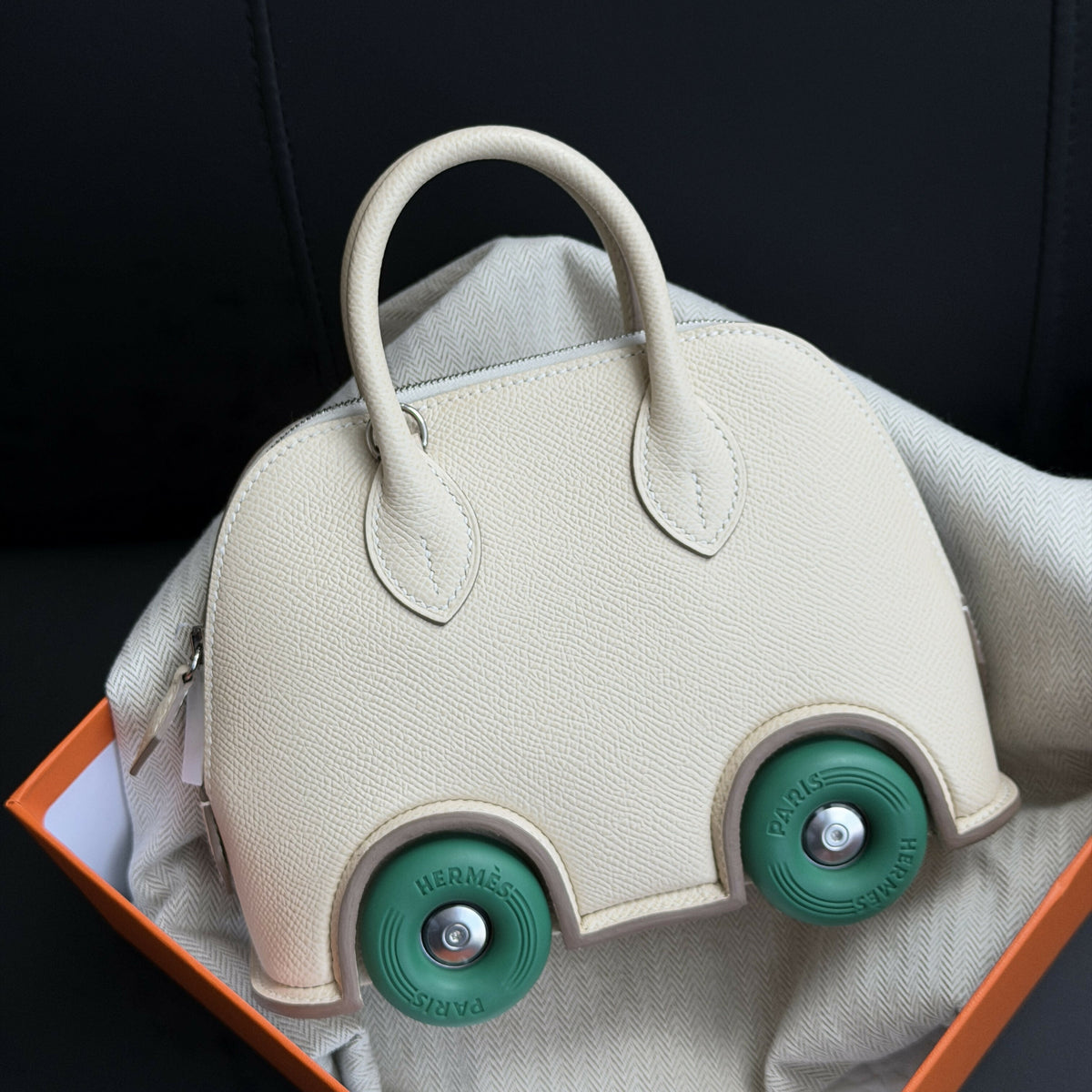 Hermès Mini Bolide On Wheels (En Désordre / Wheel Limited Edition) Nata / Craie Swift Leather with Palladium Hardware