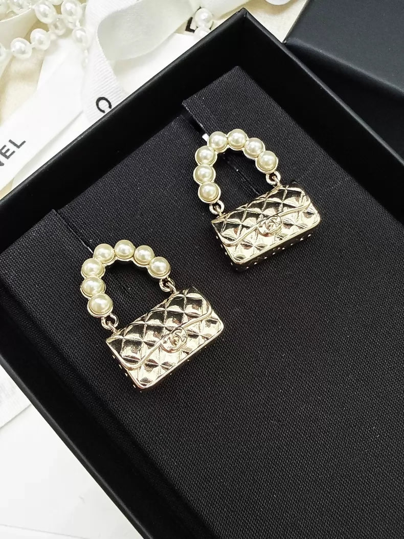 Chanel 21S light gold CF pearl quilted bag earrings