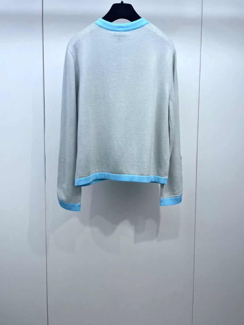 Chanel 25 blue and gray cardigan