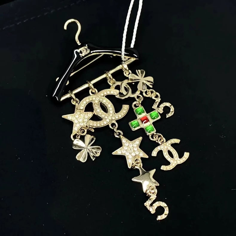 Chanel 23c rhinestone and glass pendant brooch