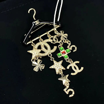 Chanel 23c rhinestone and glass pendant brooch