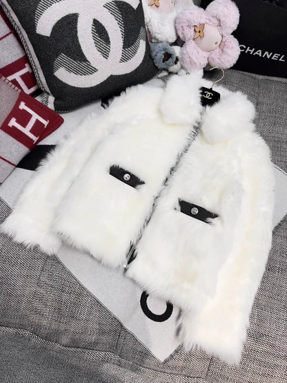 Chanel 23N Coco Neige reversible down jacket with fur collar