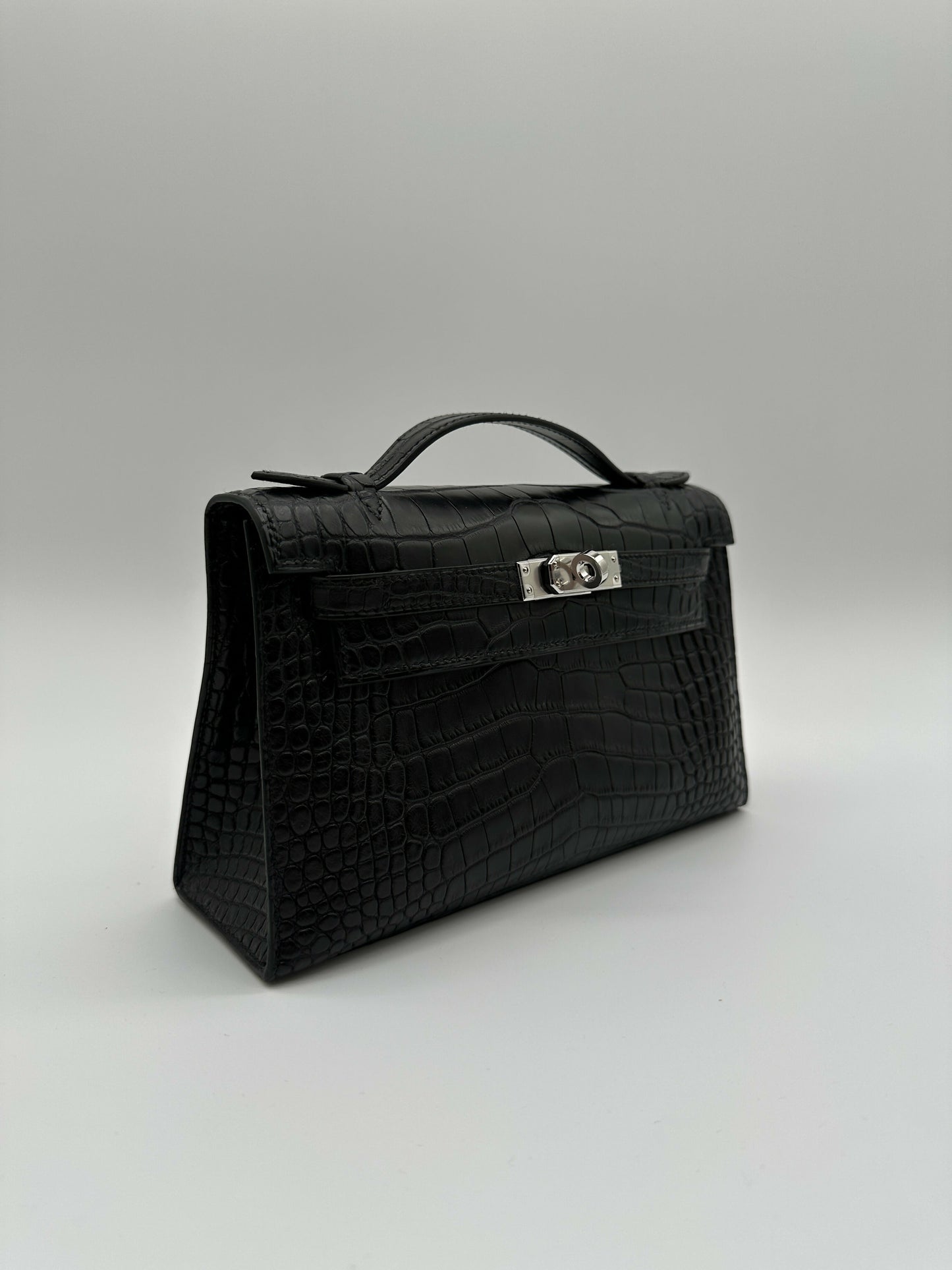 Hermès Kelly Pochette Black Matte PHW K 2025