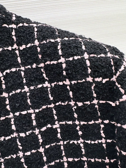 Chanel 23K jacket in black and pink checkered tweed