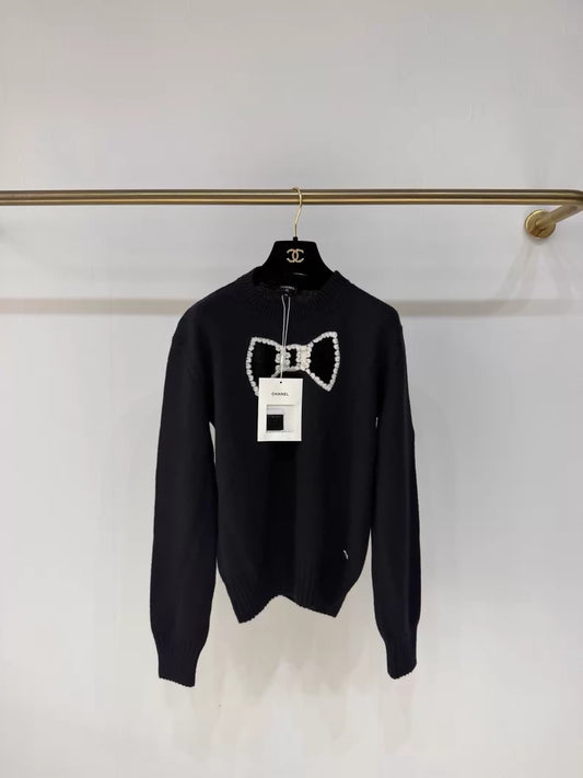 Chanel 25K black openwork bow knit sweater