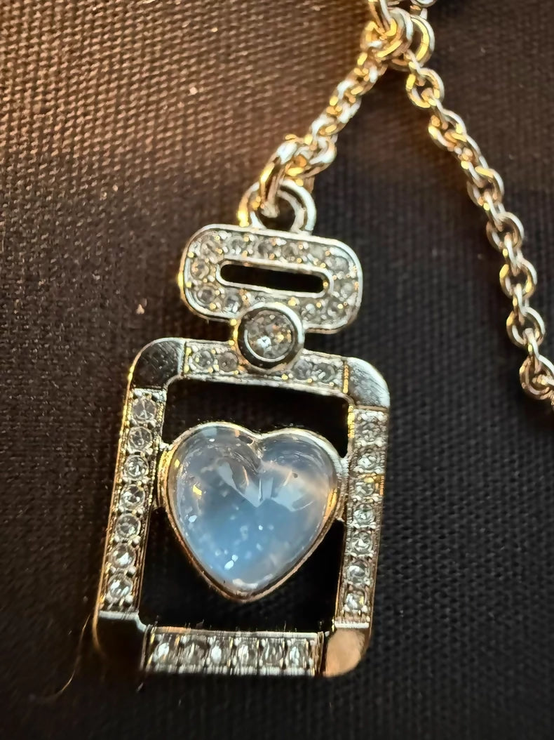Chanel 25p perfume bottle heart necklace