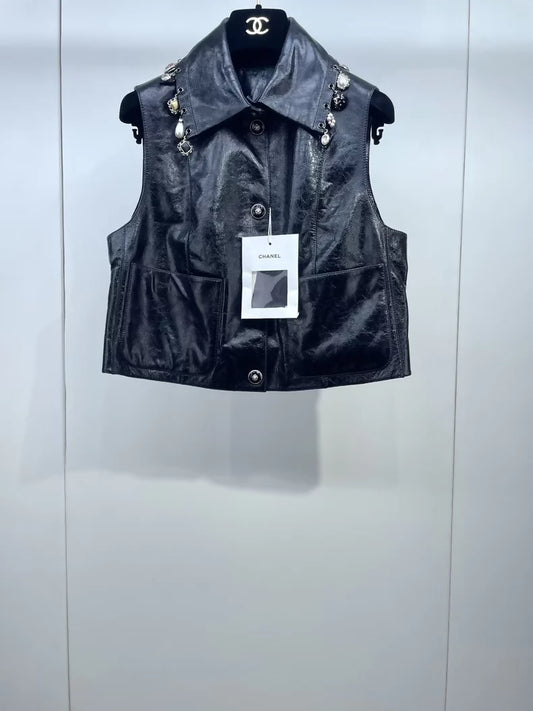 Chanel 24A black leather vest with charms