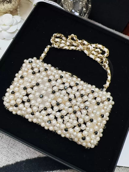Chanel 23S black and white gold metallic pearls, chain bag