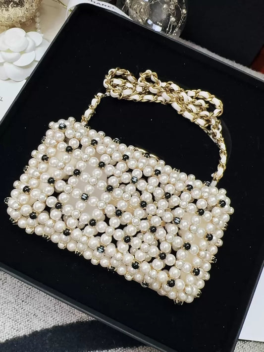 Chanel 23S black and white gold metallic pearls, chain bag