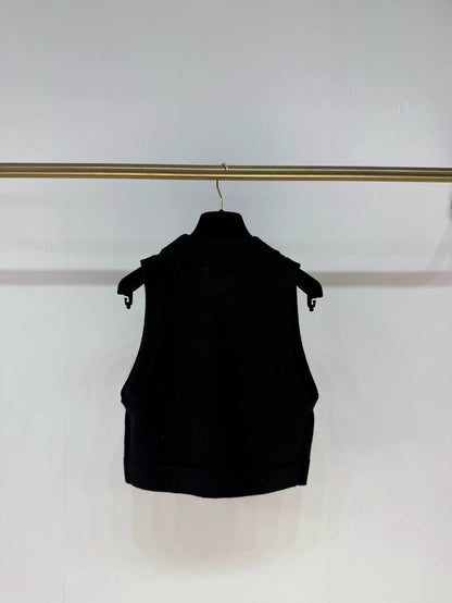 Chanel 22A black knitted vest with charms