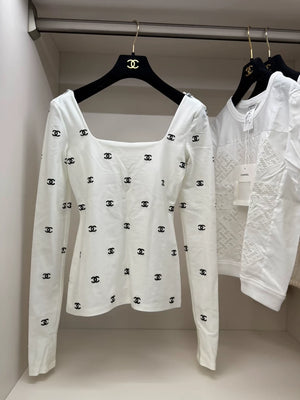 Chanel 21k white top with black cc logos