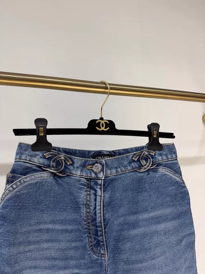 Chanel 24S jeans with the double C logo at the waist
