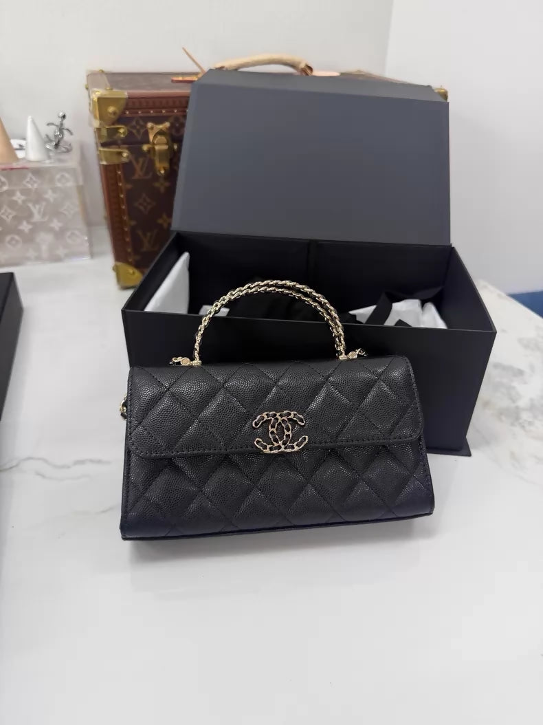 Chanel 25S black leather top handle bag gold hardware