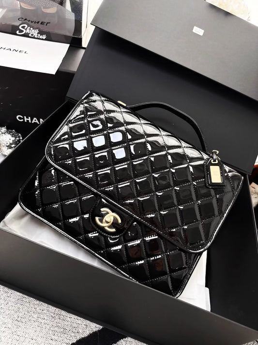 Chanel 22k black patent leather backpack