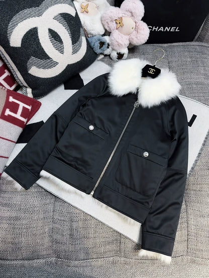 Chanel 23N Coco Neige reversible down jacket with fur collar