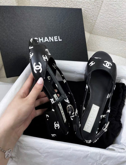 Chanel 22S  Black and White Double C Full Logo Slingback sandals