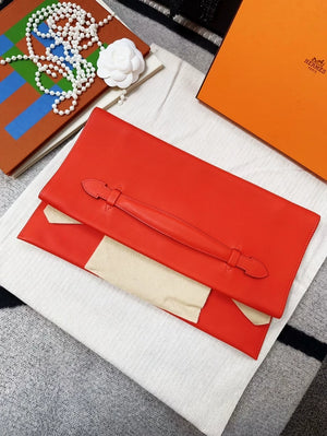 Hermes Pochette Pliplat red clutch