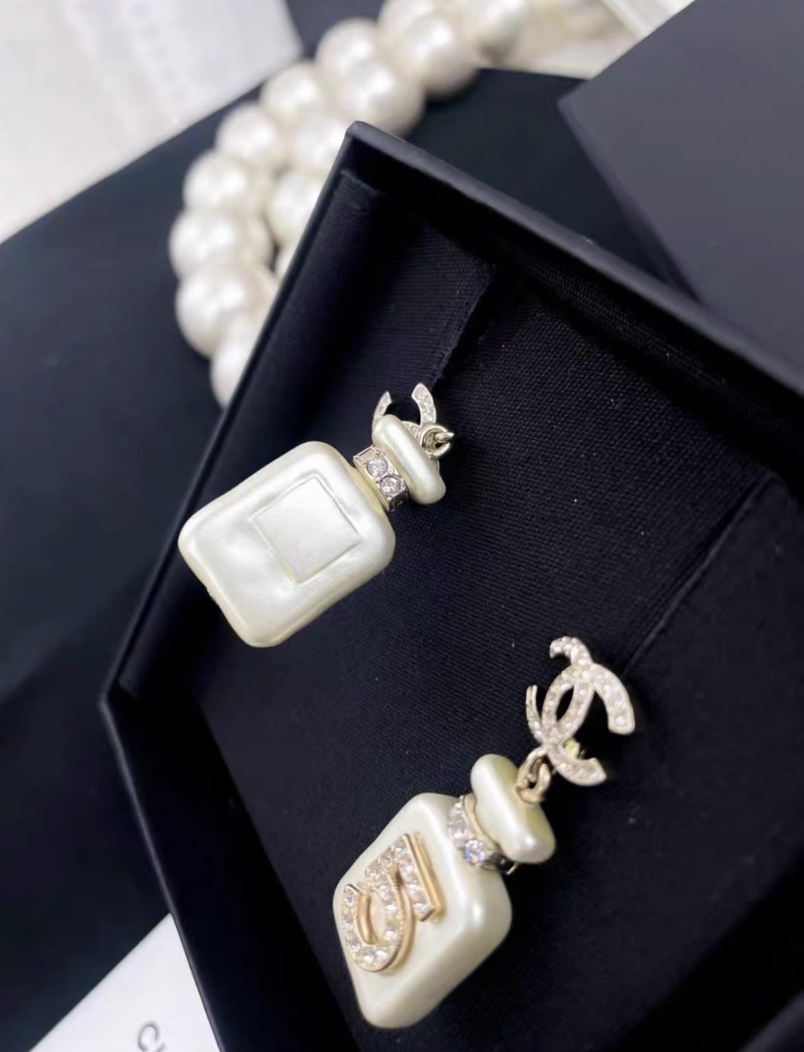 Chanel 22S No. 5 White Perfume Bottle Pendant Diamond Double C Earrings