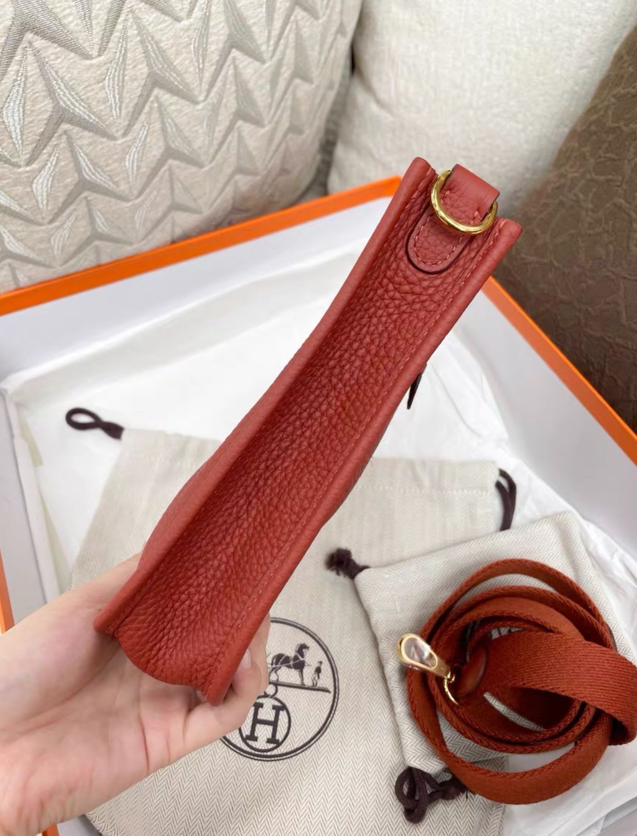 Hermes Mini evelyne brick red gold