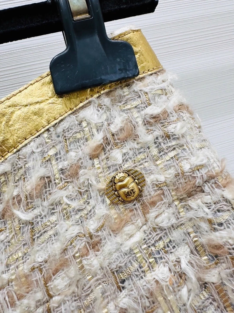 Chanel 19A gold tweed jacket and skirt set