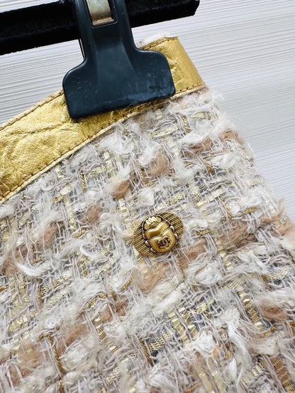 Chanel 19A gold tweed jacket and skirt set
