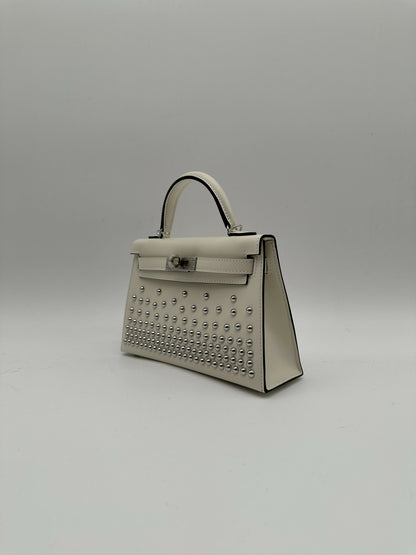 Hermès Kelly 20 Clouté Cream PHW G 2026