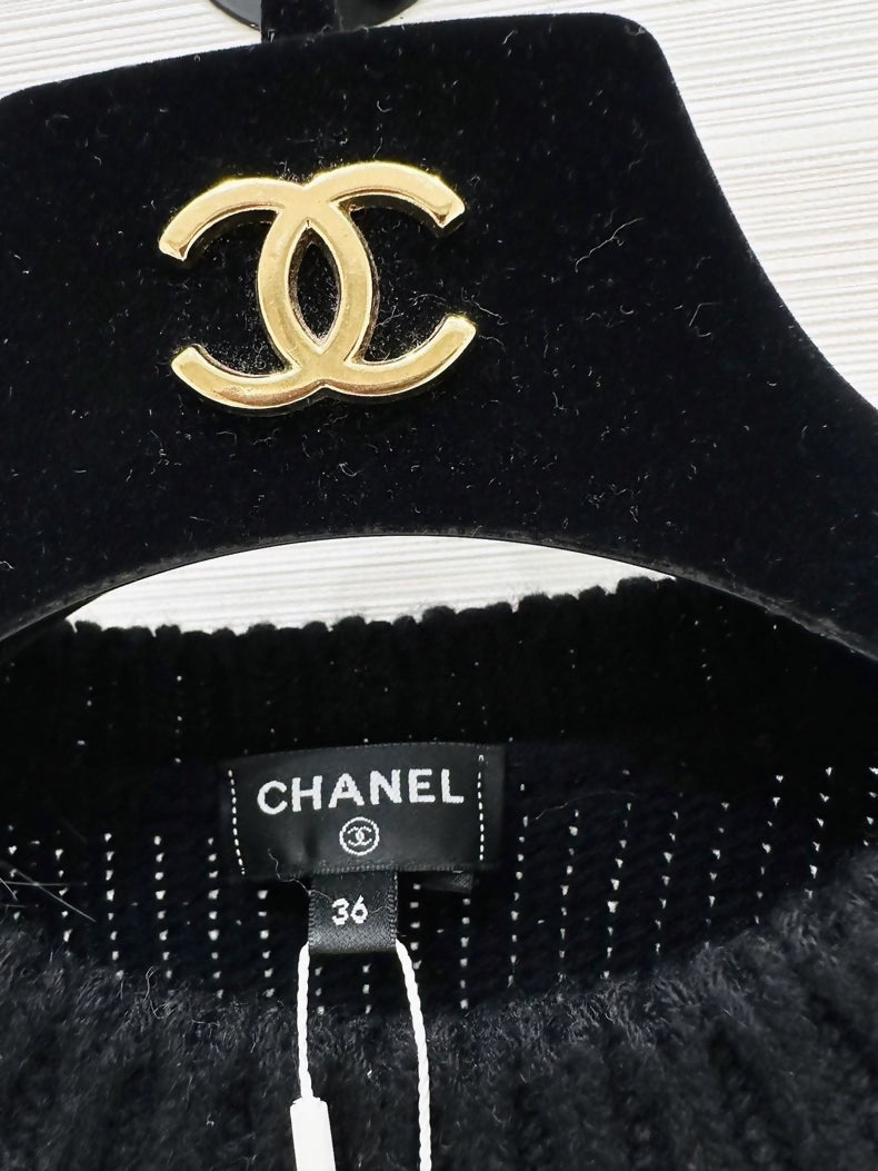 Chanel 23K black and white knit top