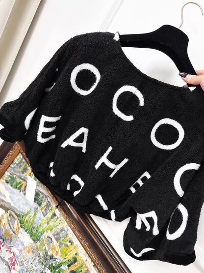 Chanel 23M black and white CC terry cloth top