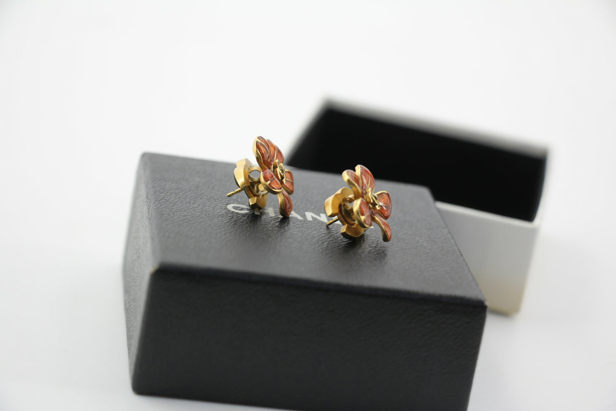 Chanel 03P Enamel Orange Five-Petal Flower Green CC Stacked Earrings