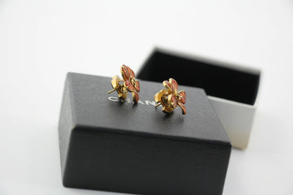 Chanel 03P Enamel Orange Five-Petal Flower Green CC Stacked Earrings