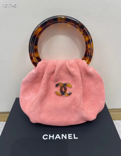 Chanel 26C tortoiseshell handle pink suede handbag