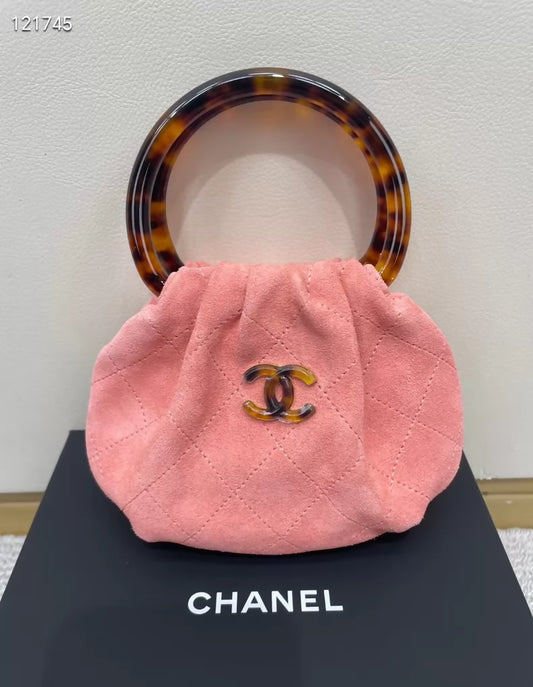 Chanel 26C tortoiseshell handle pink suede handbag