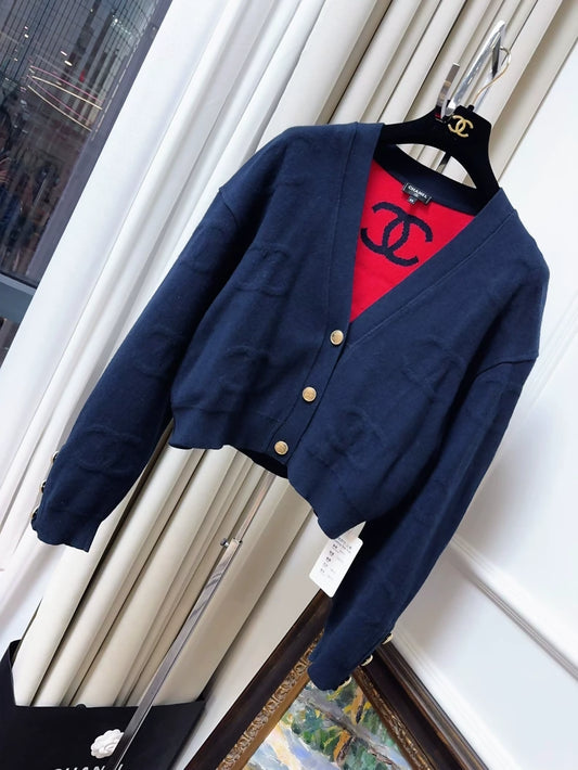 Chanel 21P dark blue with red embossed double C cardigan