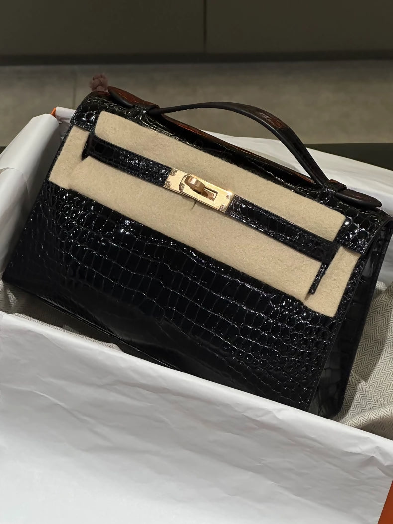 Hermes Kelly Pochette Black shiny Crocodile leather gold hardware