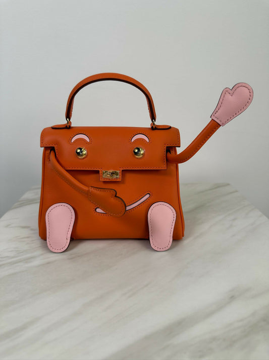 Hermès Kelly Doll Orange / Rose Sakura PHW W 2026