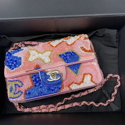 CHANEL 23A featuring colorful beaded sequins and heavy embroidery