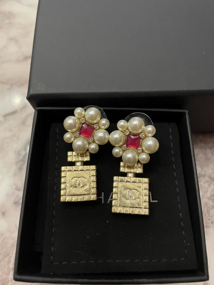Chanel 21P floral perfume bottle earrings