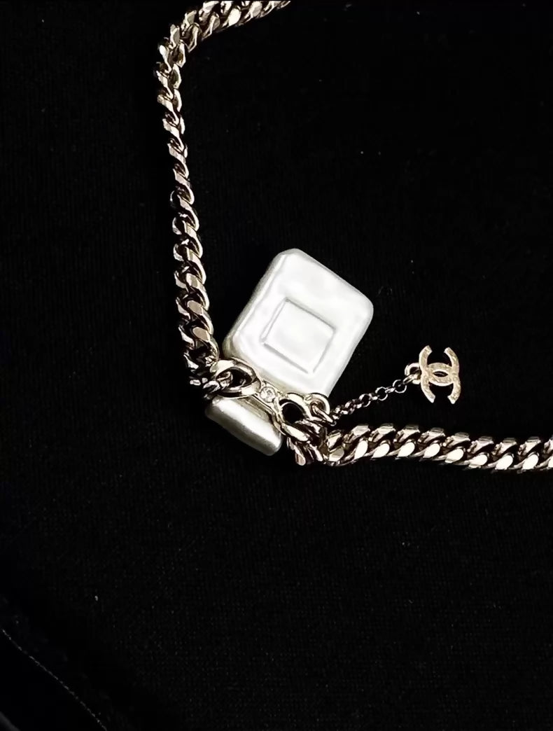 Chanel 22S White Pearl No. 5 Perfume Bottle Necklace