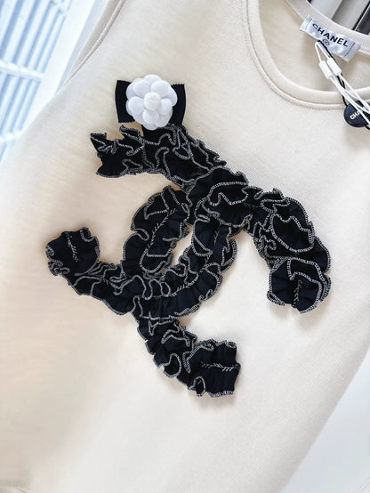 Chanel 20A ecru & black top