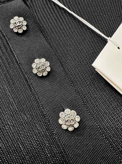 Chanel 26A Black Knit Top with Rhinestone Flower Button, Short Sleeve, F34