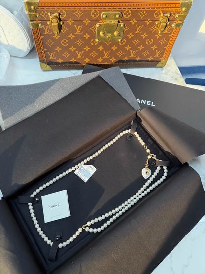 Chanel 24p heart-shaped pearl pendant waist chain